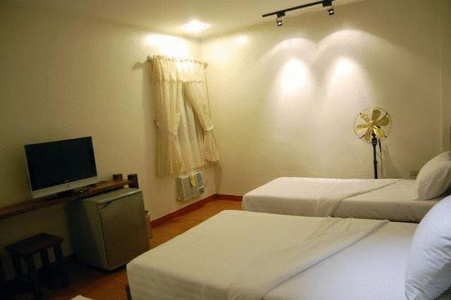 Hôtel Ilocos Rosewell Chambre photo