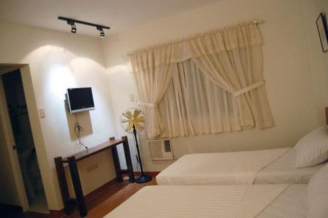 Hôtel Ilocos Rosewell Chambre photo
